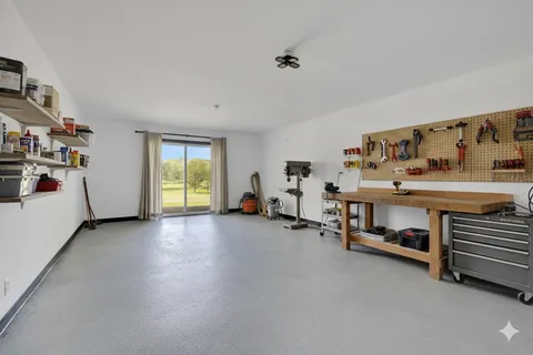 a view of balcony with wooden floor