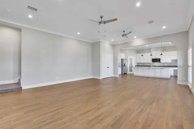 a view of kitchen with wooden floor and window