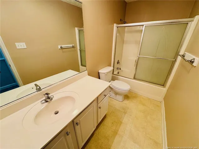 a view of a big room with carpet