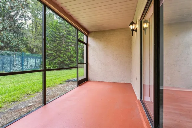 a view of a garden from a balcony