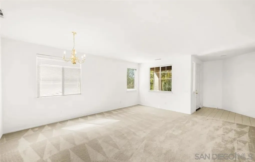 46197 Via La Tranquila Temecula, CA 92592 - Photo 12 of 20 an empty room with windows