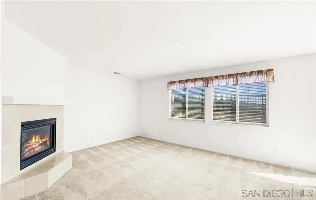 46197 Via La Tranquila Temecula, CA 92592 - Photo 14 of 20 an empty room with a window