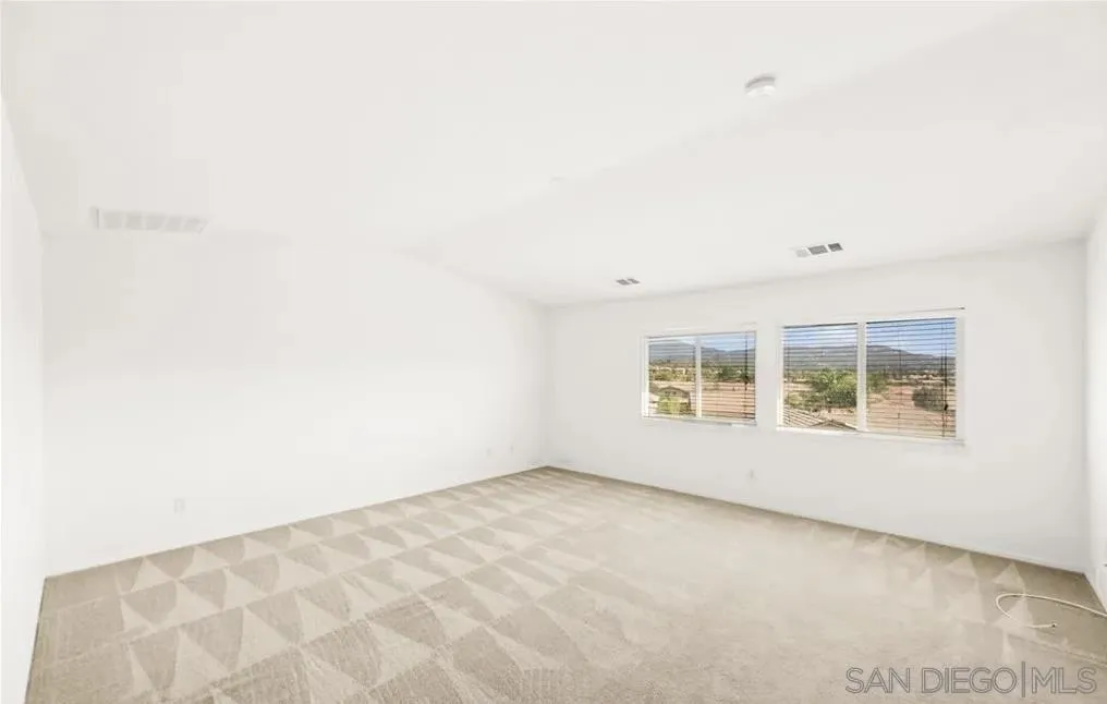 46197 Via La Tranquila Temecula, CA 92592 - Photo 18 of 20 an empty room with a window