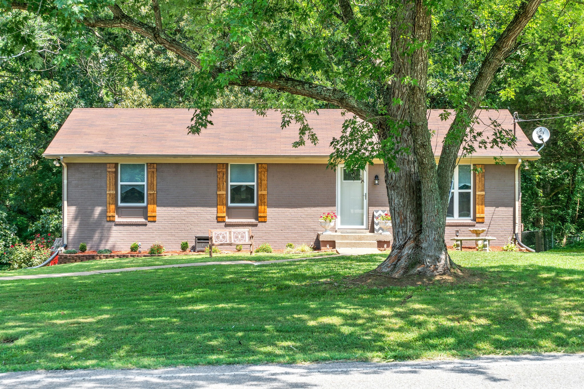 333 Dean Road Clarksville, TN 37040 - Photo 2 of 30 a front view of a house with a yard porch and sitting area