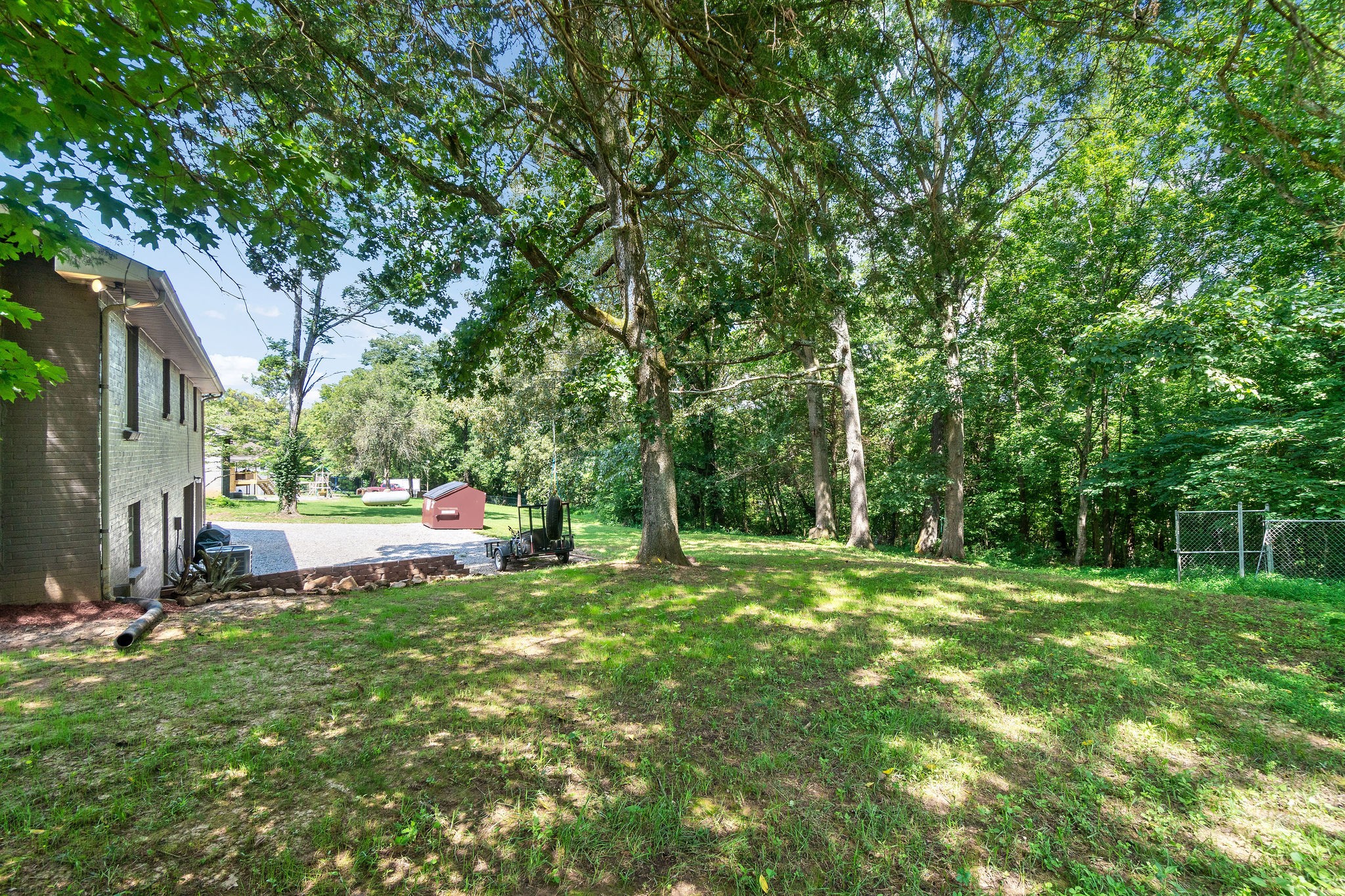 333 Dean Road Clarksville, TN 37040 - Photo 26 of 30 a view of a backyard with large trees