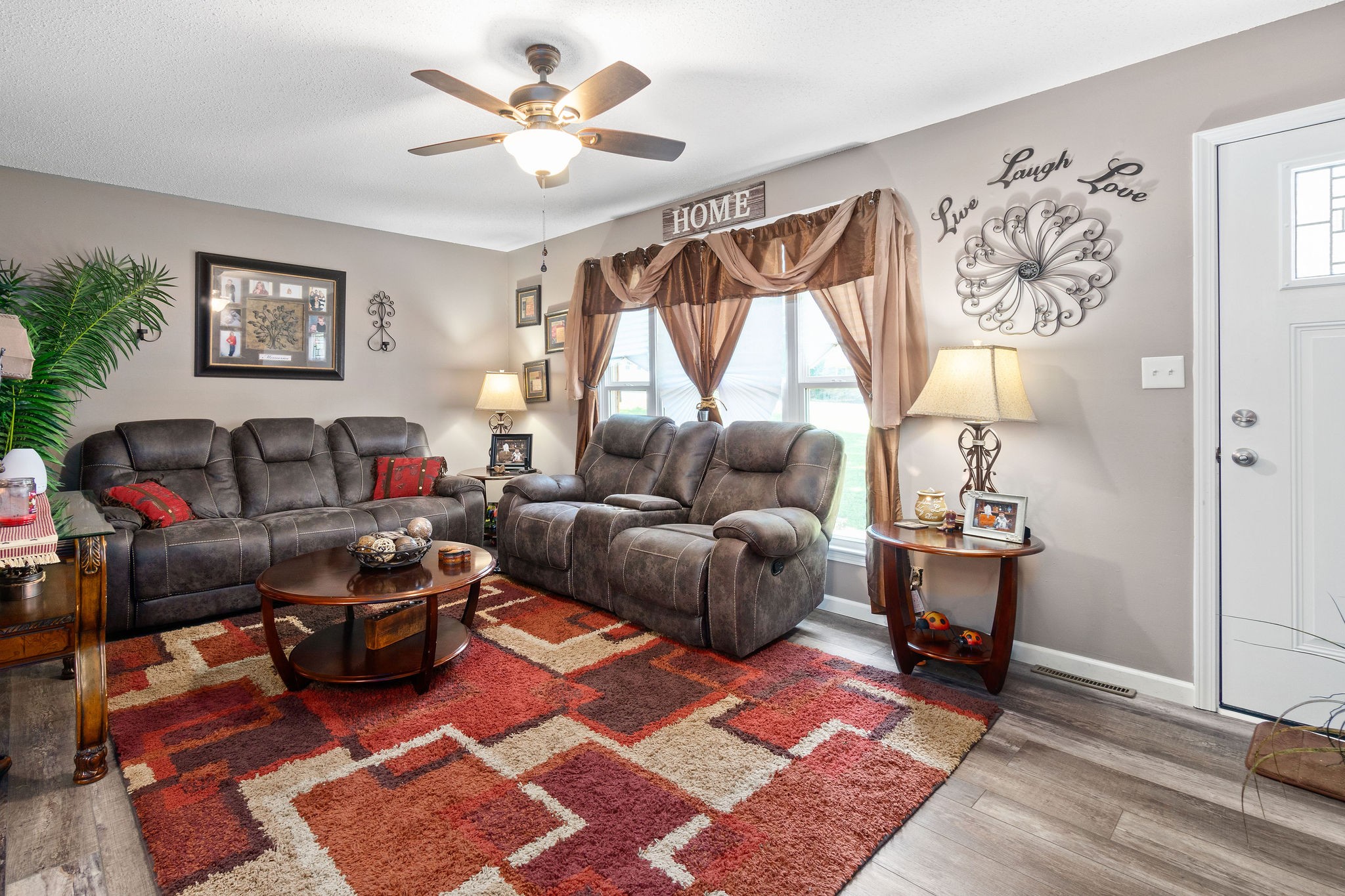 333 Dean Road Clarksville, TN 37040 - Photo 6 of 30 a living room with furniture a rug and a window