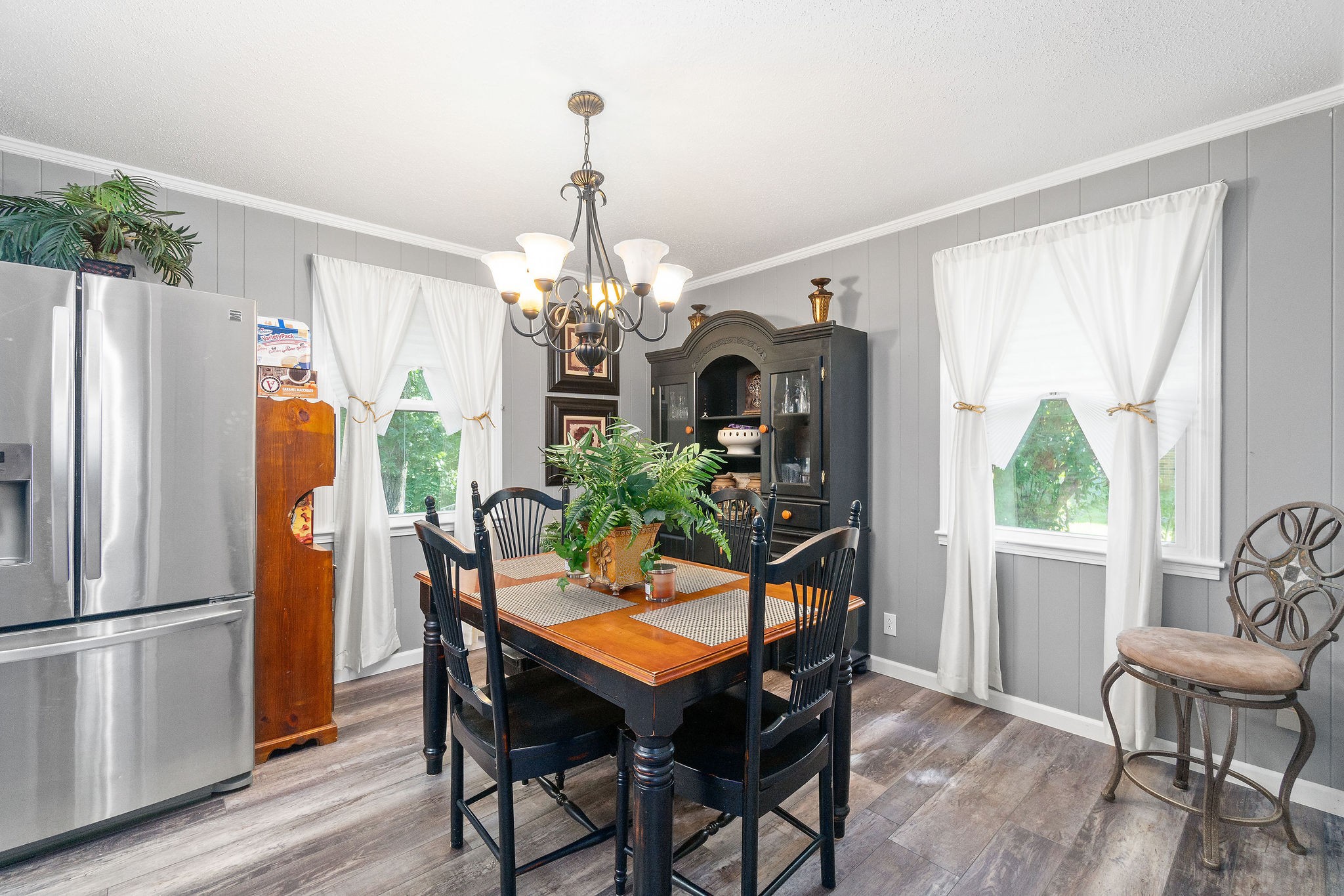 333 Dean Road Clarksville, TN 37040 - Photo 9 of 30 a view of a dining room with furniture window and wooden floor