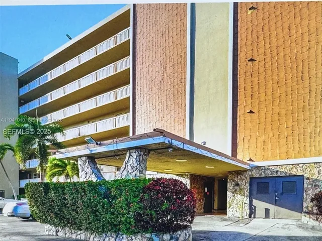 a view of a building with the front door