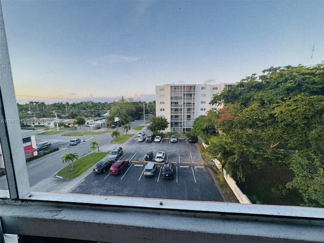 a view of swimming pool from a balcony