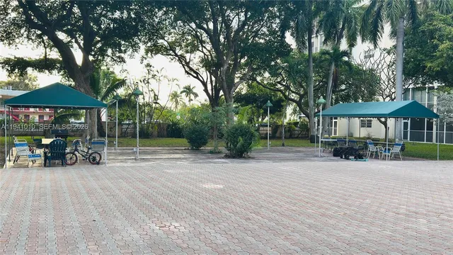 front view of a house with a garden