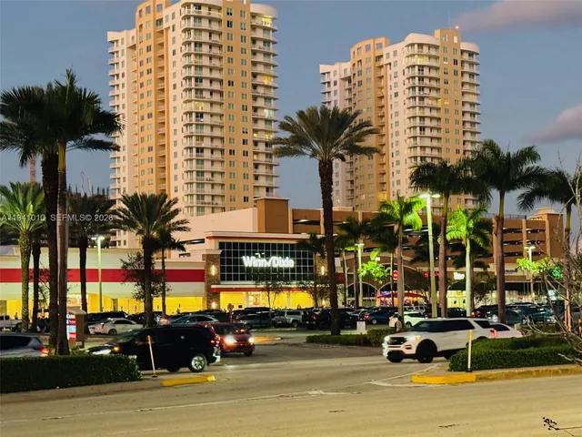 a view of a building with sitting area