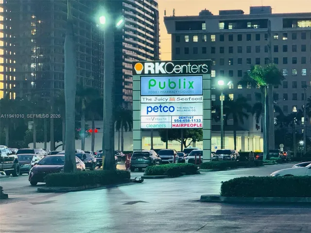 a view of a street with cars