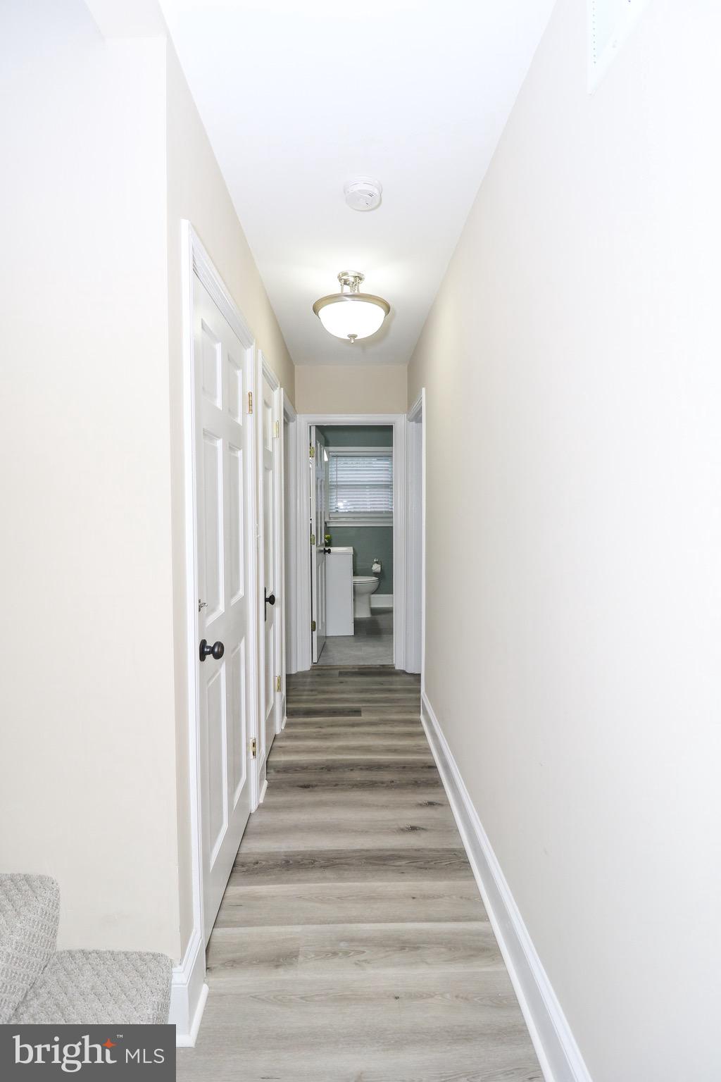 306 Lanark Way Silver Spring, MD 20901 - Photo 24 of 47 Main Level Hallway Leading to Full Bath & 2 Bedrms