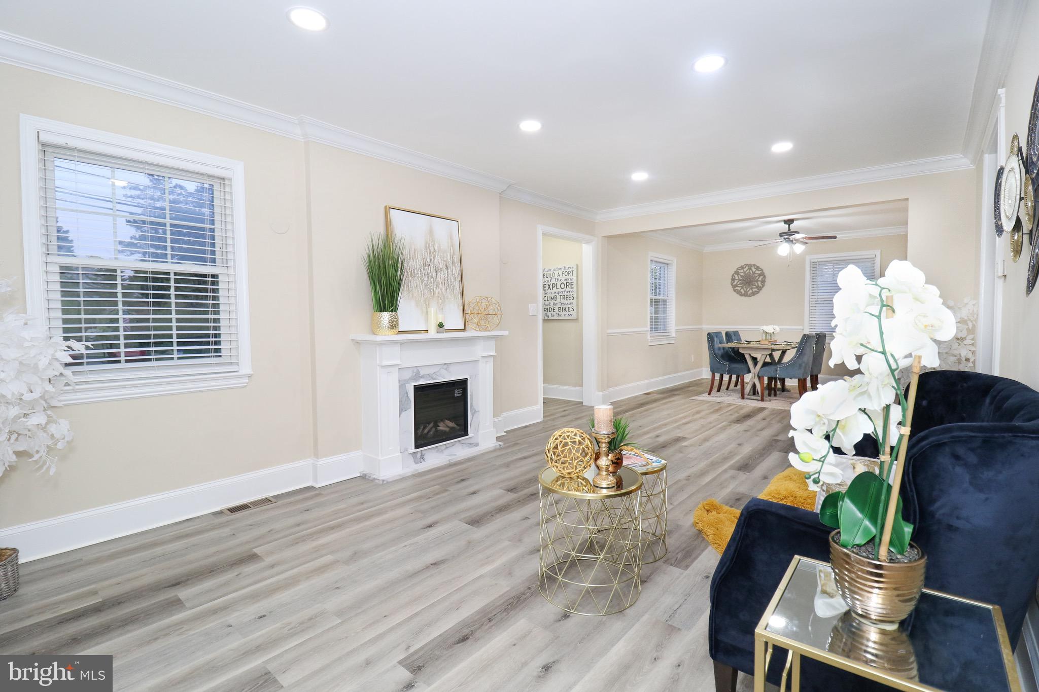 306 Lanark Way Silver Spring, MD 20901 - Photo 4 of 47 The Living Room Flows to a Large Porch!