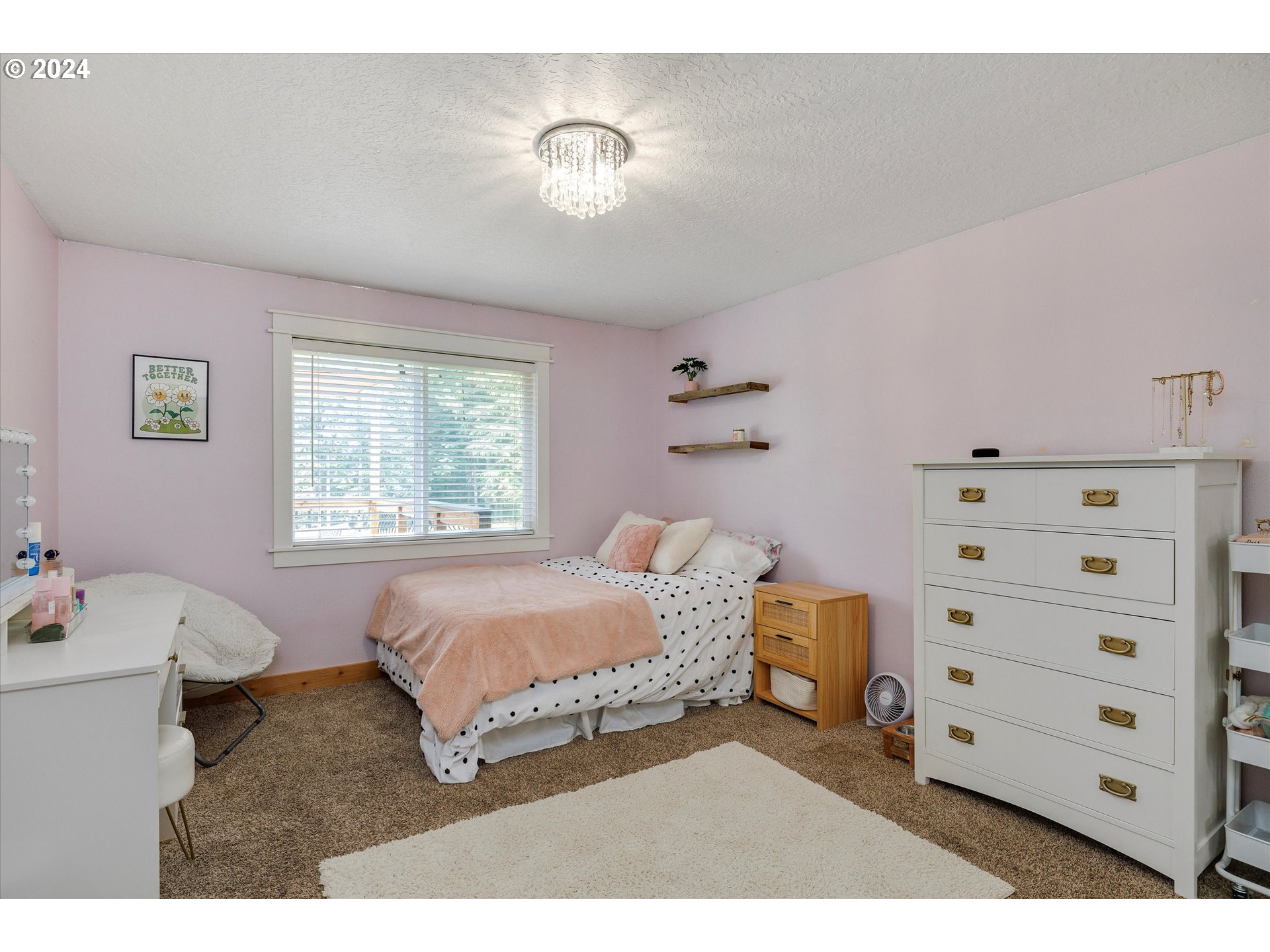 8431 Southeast Groce Road Corbett, OR 97019 - Photo 12 of 37 a bedroom with a bed and a window