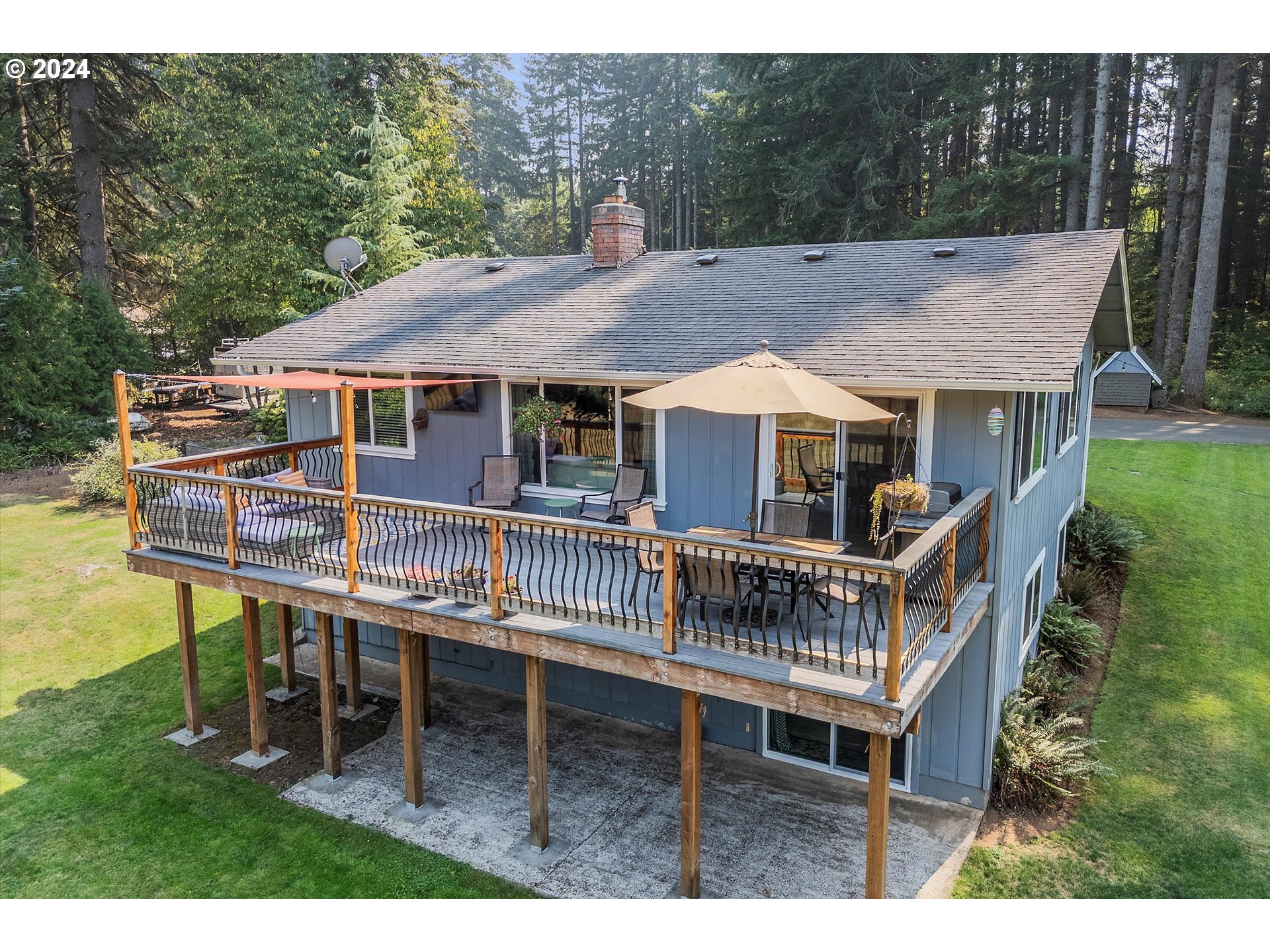 8431 Southeast Groce Road Corbett, OR 97019 - Photo 21 of 37 a roof deck with table and chairs