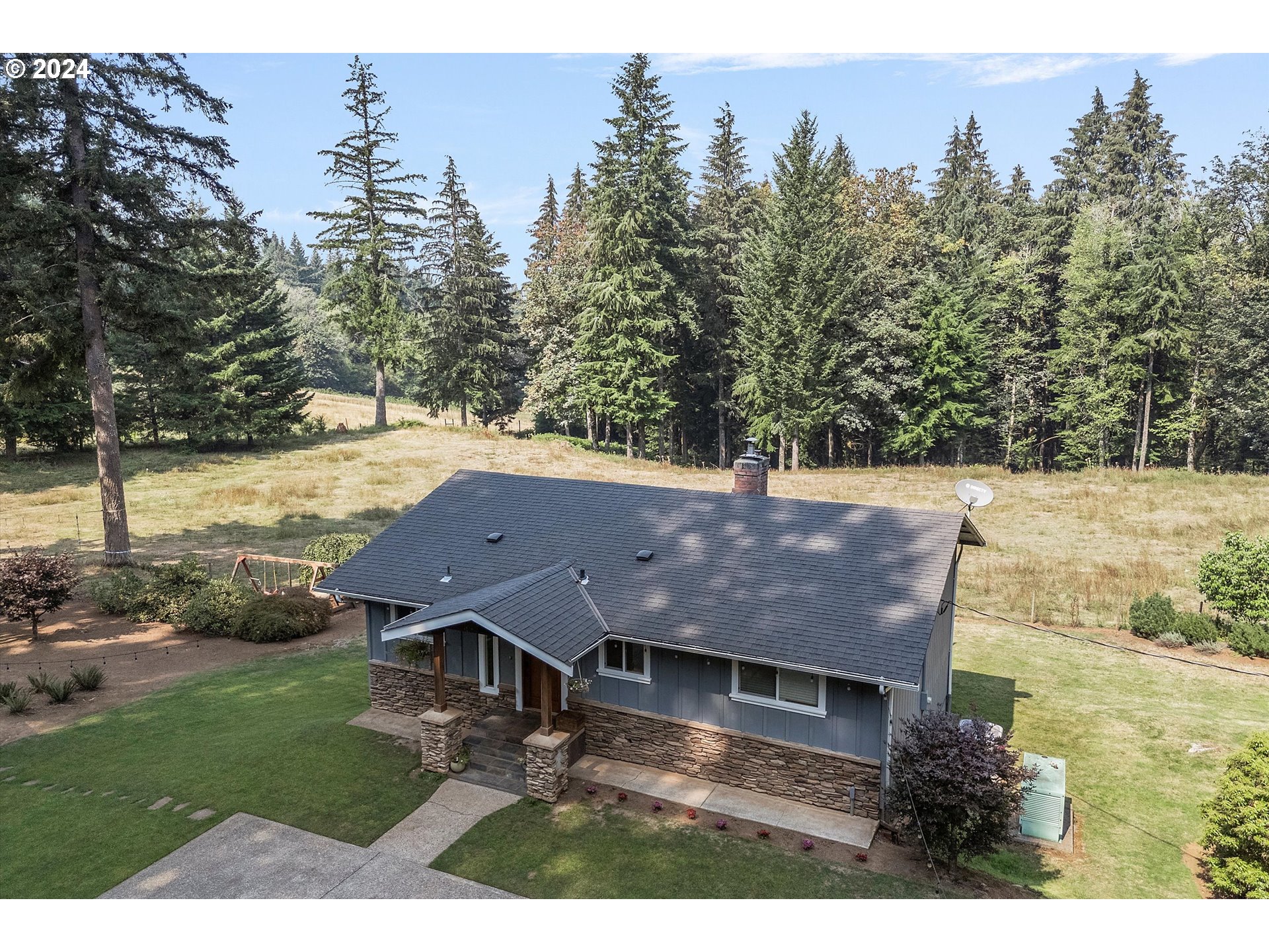 8431 Southeast Groce Road Corbett, OR 97019 - Photo 29 of 37 a view of a house with a yard