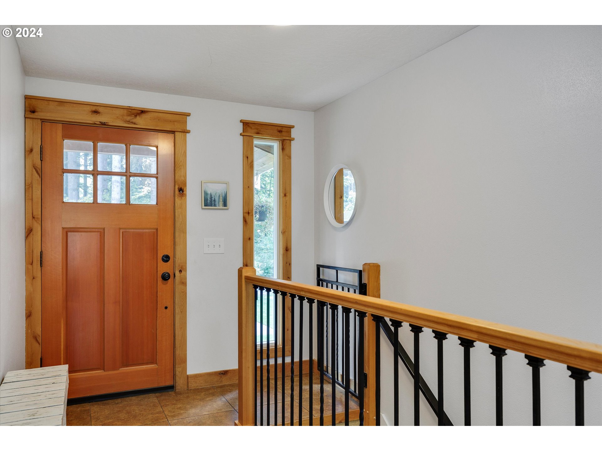 8431 Southeast Groce Road Corbett, OR 97019 - Photo 4 of 37 a view of staircase with railing and a window