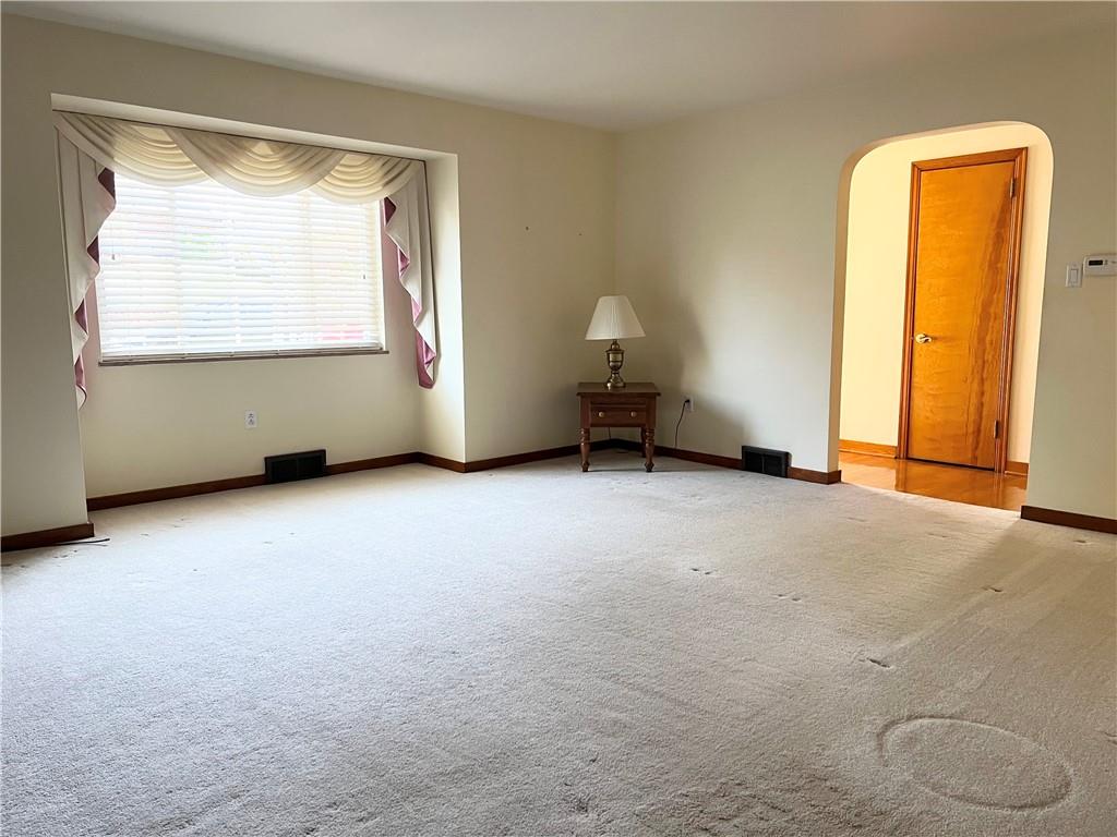 233 Reed Street Lower Burrell, PA 15068 - Photo 12 of 40 Spacious living room with ample natural light.