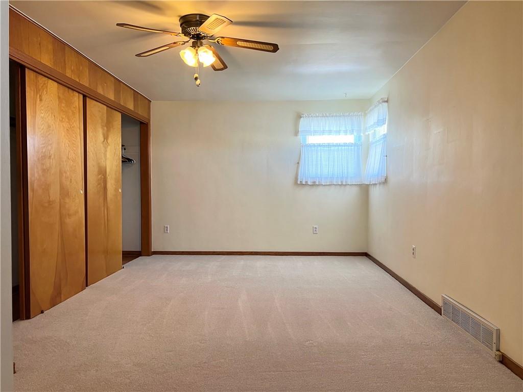233 Reed Street Lower Burrell, PA 15068 - Photo 19 of 40 Master bedroom with wall to wall carpet.