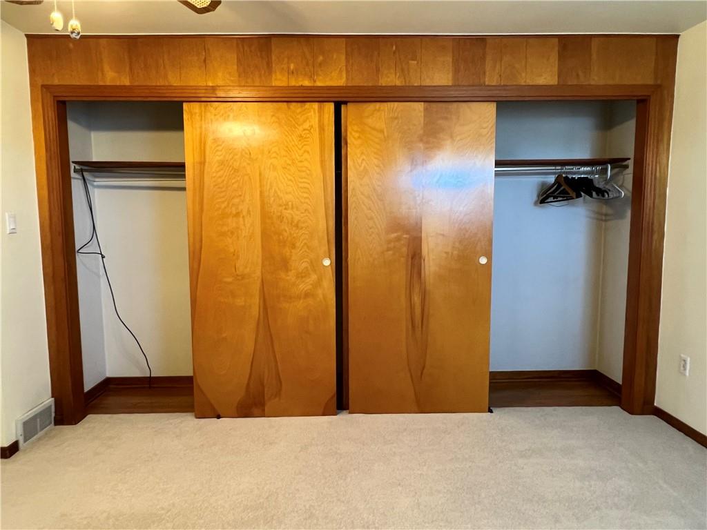 233 Reed Street Lower Burrell, PA 15068 - Photo 20 of 40 Master bedroom closet. Hardwood flooring under carpet.