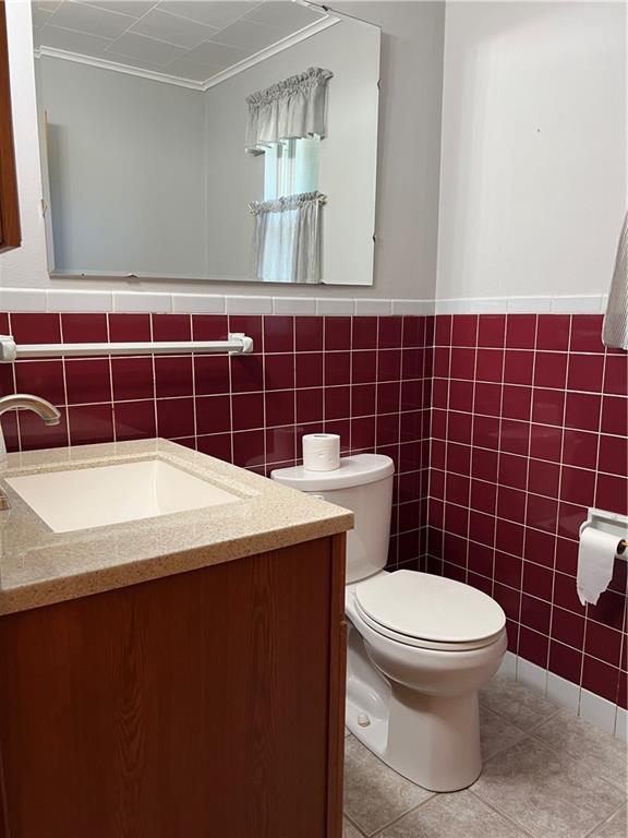 233 Reed Street Lower Burrell, PA 15068 - Photo 22 of 40 Half bath off of master bedroom with ceramic flooring.