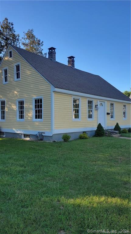 465 Main Street Killingly, CT 06239 - Photo 1 of 1 a view of a backyard with plants and a garden