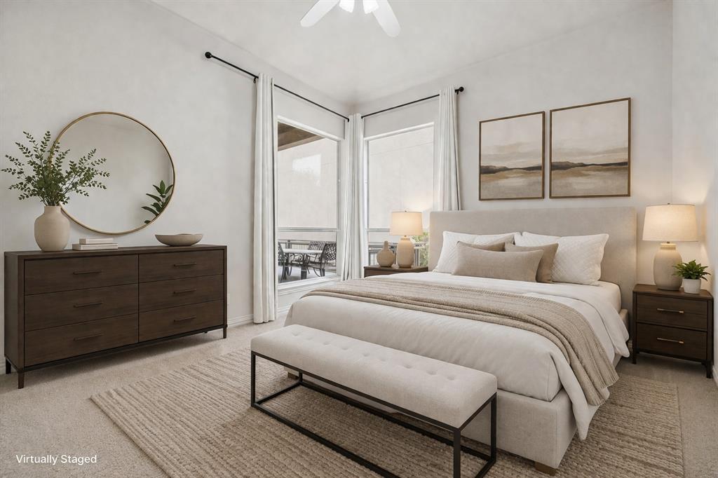 3309 Ricci Lane Irving, TX 75062 - Photo 21 of 36 Bedroom featuring light colored carpet and ceiling fan