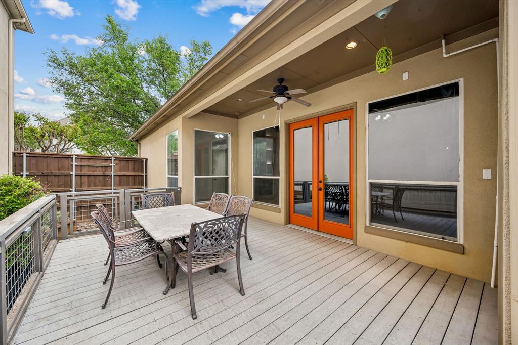 3309 Ricci Lane Irving, TX 75062 - Photo 26 of 36 Wooden deck with french doors, outdoor dining space, and ceiling fan