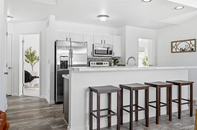 a bathroom with a sink double vanity and a mirror