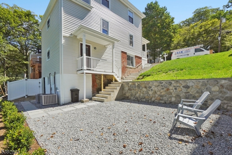 75 Chestnut Street Morristown, NJ 07960 - Photo 15 of 16 a view of a backyard with a garden and entertaining space