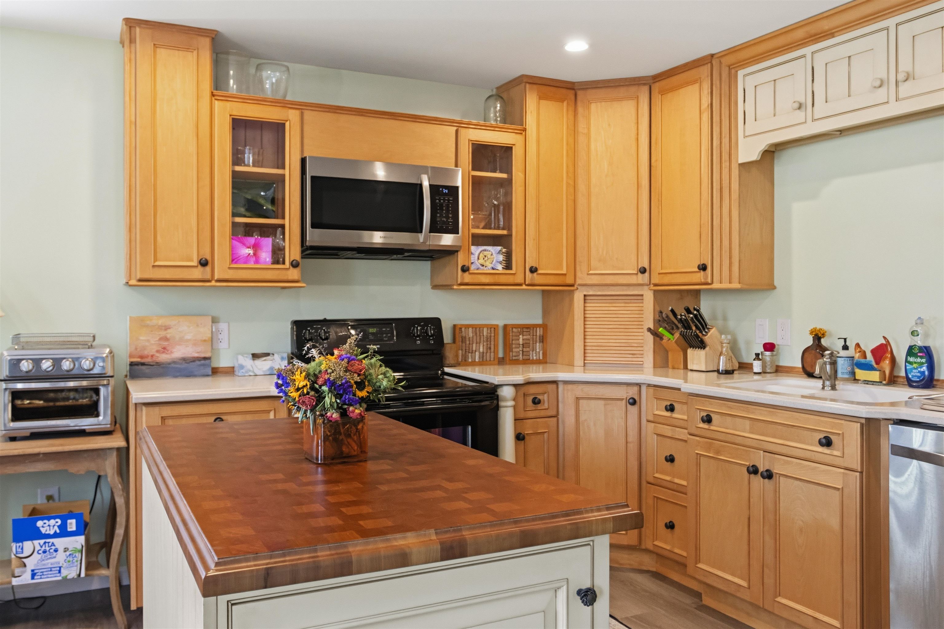 1001 Highway 47 Rio Grande, NJ 08242 - Photo 11 of 37 a kitchen with stainless steel appliances granite countertop a stove and a microwave