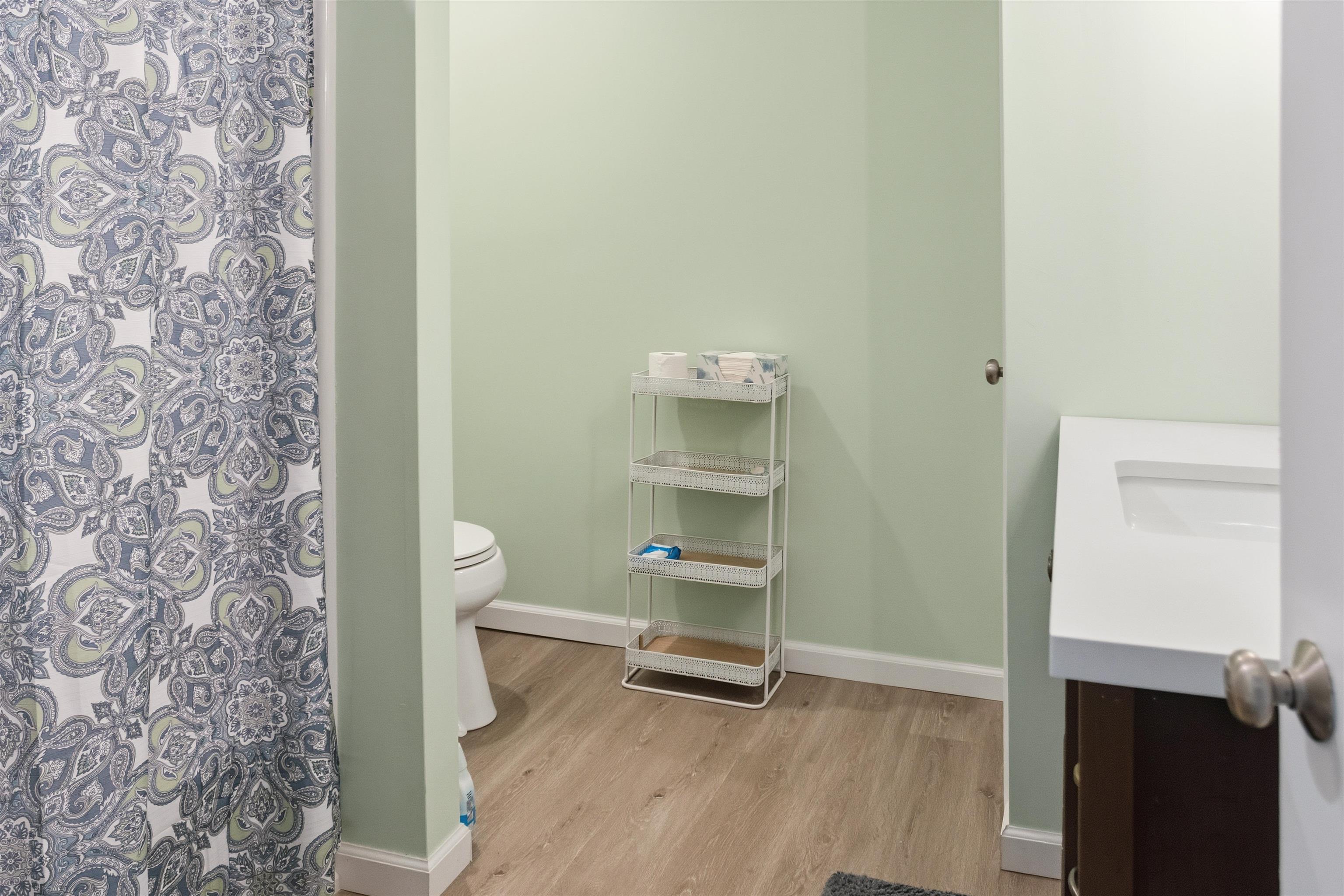 1001 Highway 47 Rio Grande, NJ 08242 - Photo 20 of 37 a room with a bench and a wooden floor