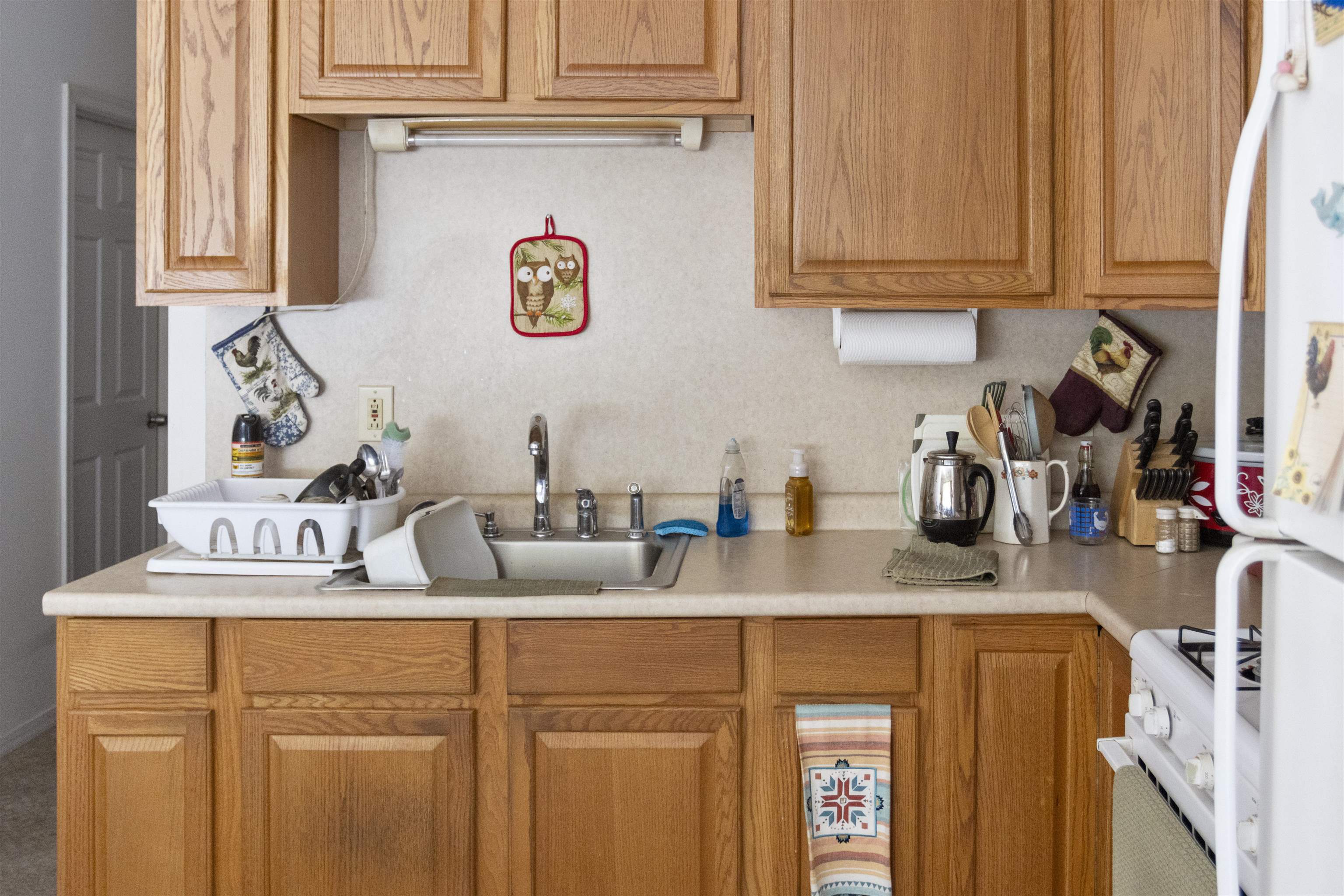 1001 Highway 47 Rio Grande, NJ 08242 - Photo 31 of 37 a kitchen with stainless steel appliances granite countertop a sink and cabinets