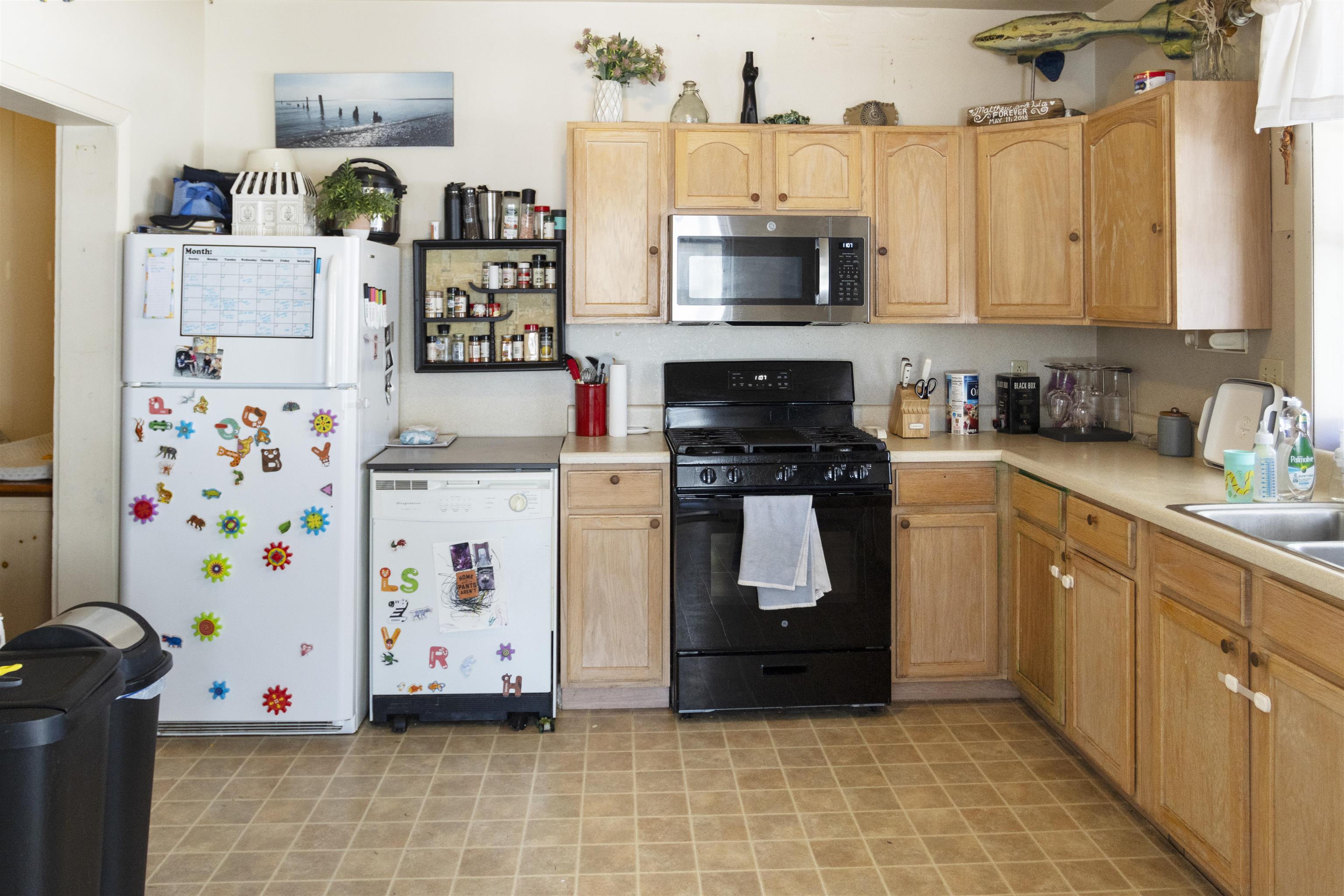 1001 Highway 47 Rio Grande, NJ 08242 - Photo 32 of 37 a kitchen with refrigerator and cabinets