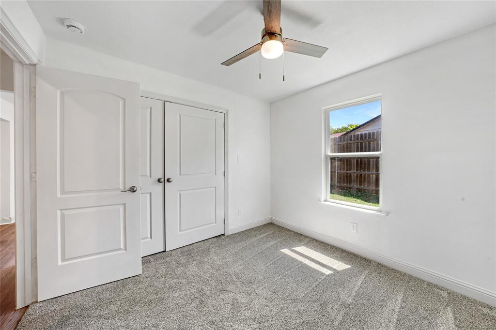 1608 Wynn Terrace Arlington, TX 76010 - Photo 17 of 28 a view of an empty room with a window