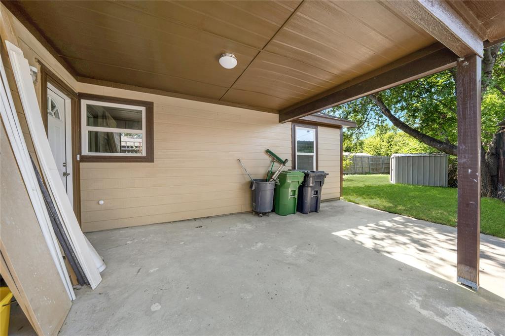 1608 Wynn Terrace Arlington, TX 76010 - Photo 24 of 28 a view of a house with porch and garden