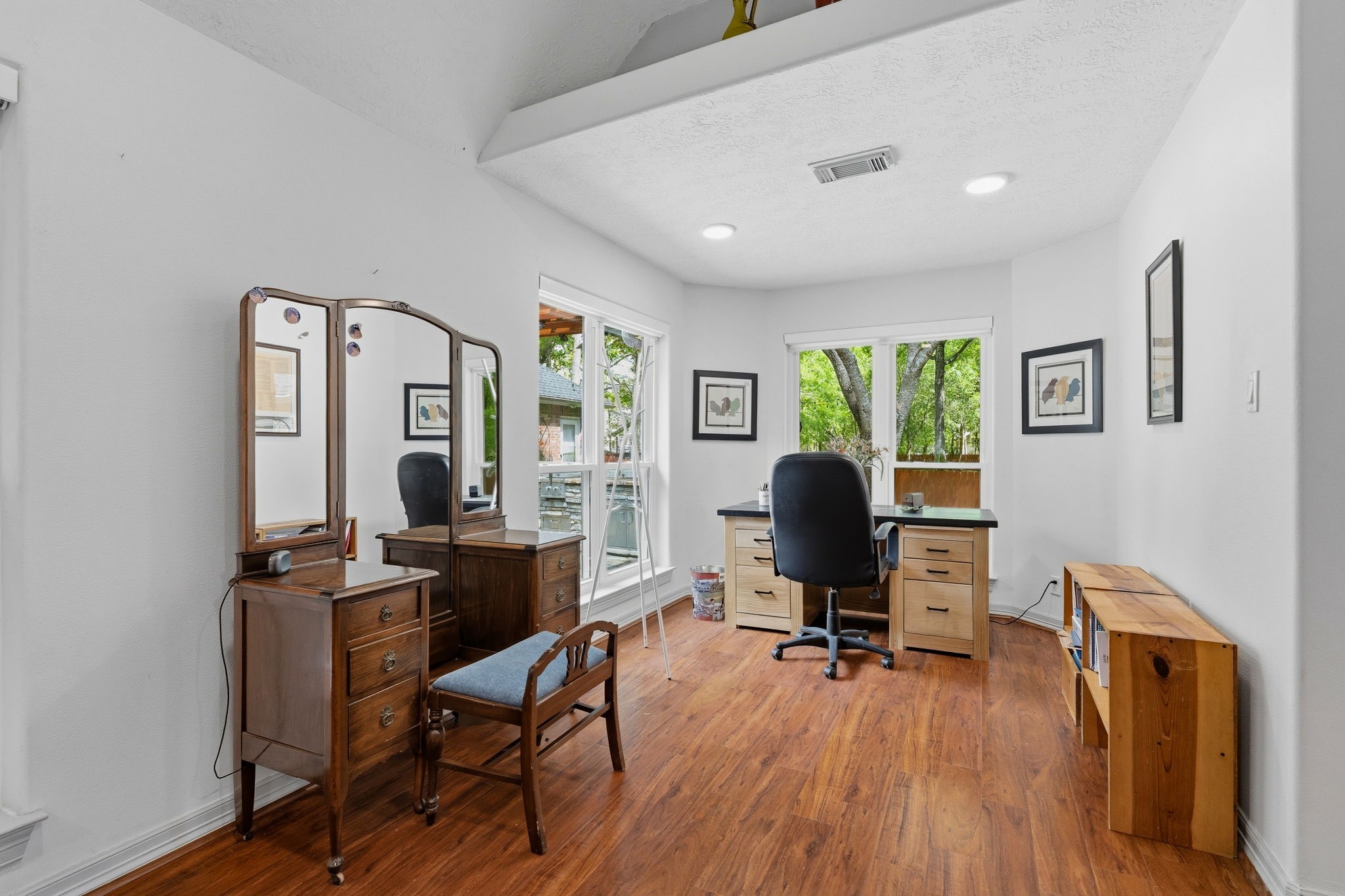 11714 Creek View Lane Conroe, TX 77385 - Photo 19 of 46 a view of a workspace with furniture and a window