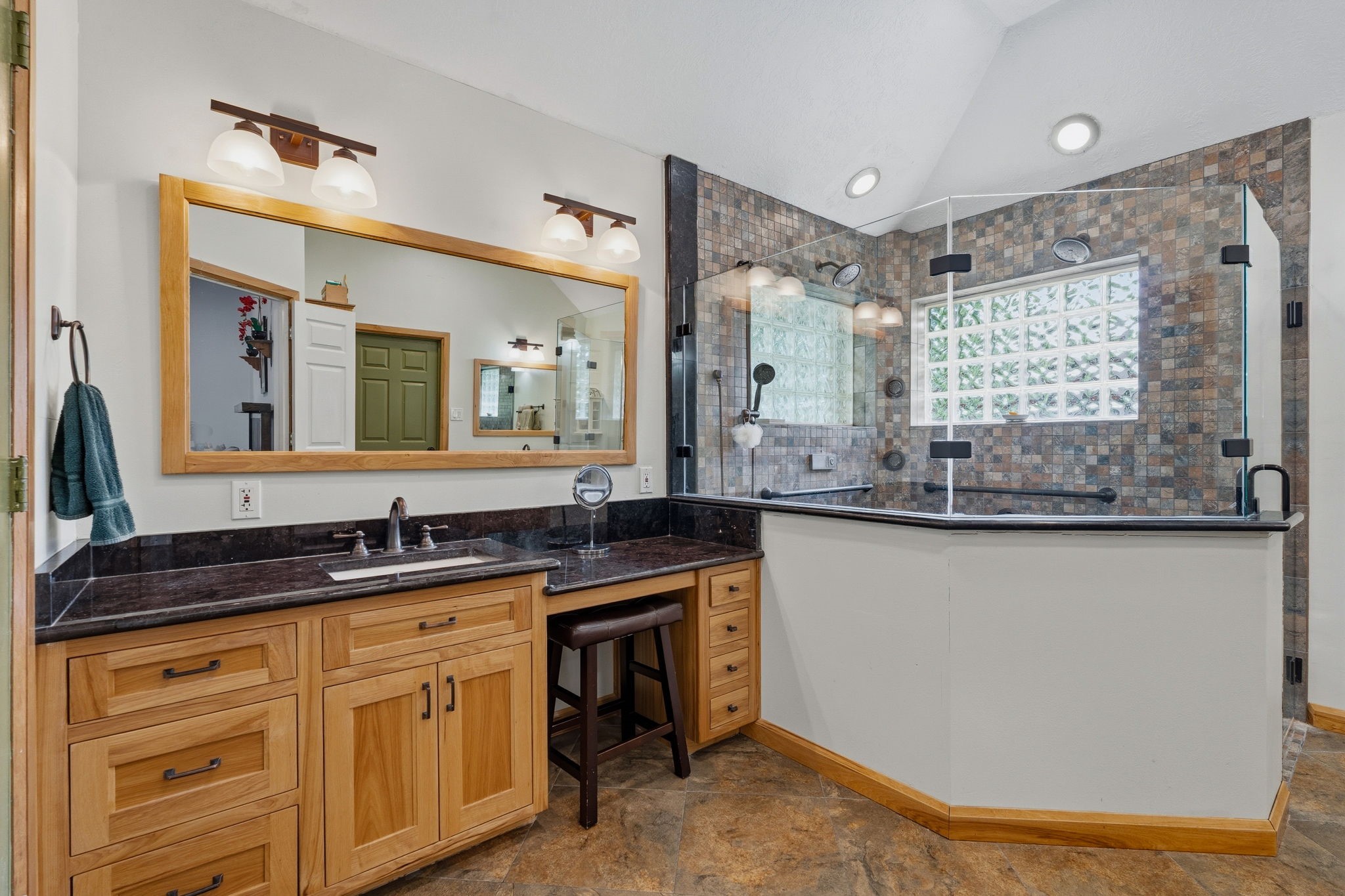 11714 Creek View Lane Conroe, TX 77385 - Photo 20 of 46 a bathroom with a granite countertop sink mirror and