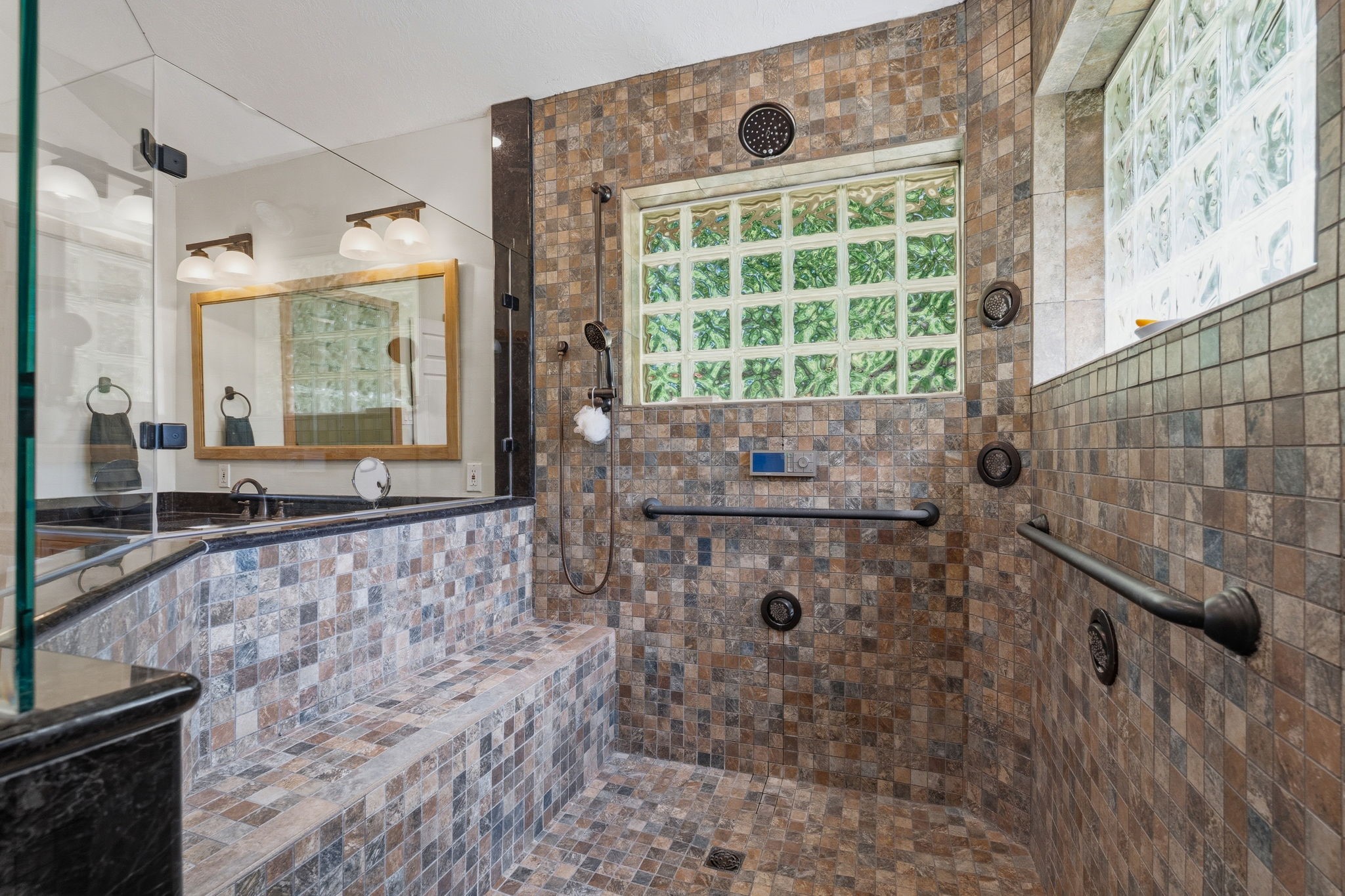 11714 Creek View Lane Conroe, TX 77385 - Photo 22 of 46 a bathroom with a bathtub and a shower