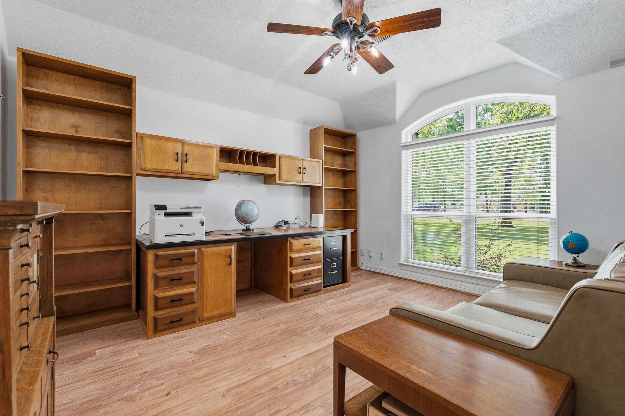 11714 Creek View Lane Conroe, TX 77385 - Photo 27 of 46 a living room with furniture and a large window