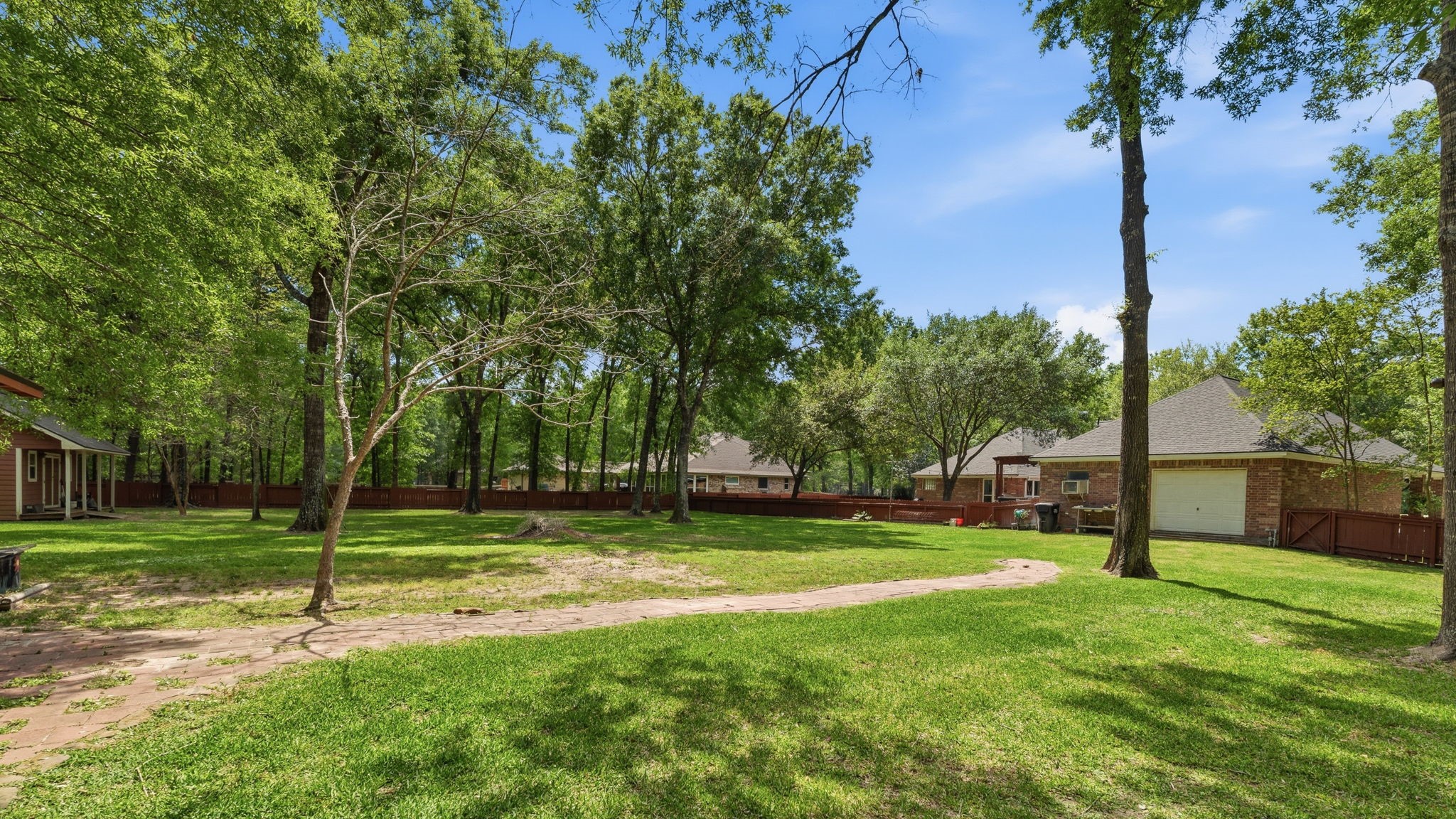 11714 Creek View Lane Conroe, TX 77385 - Photo 39 of 46 a view of a park with large trees