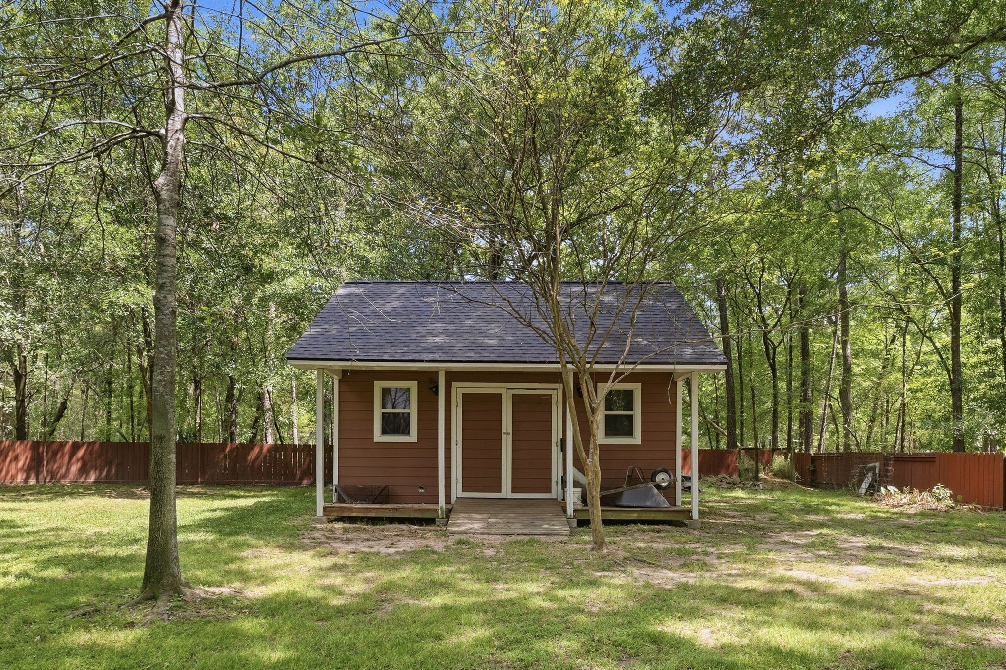 11714 Creek View Lane Conroe, TX 77385 - Photo 41 of 46 a house that has yard in front of it