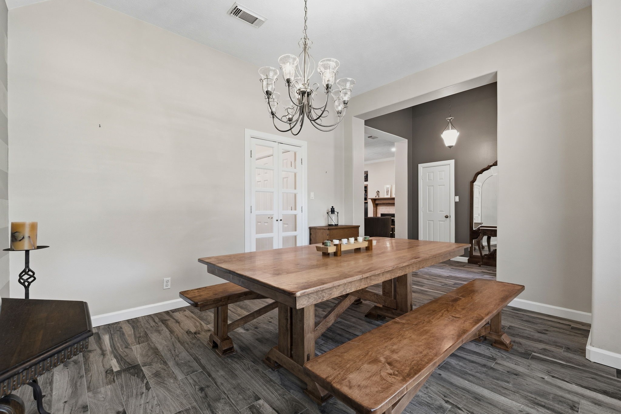 11714 Creek View Lane Conroe, TX 77385 - Photo 7 of 46 a view of a dining room with furniture and wooden floor