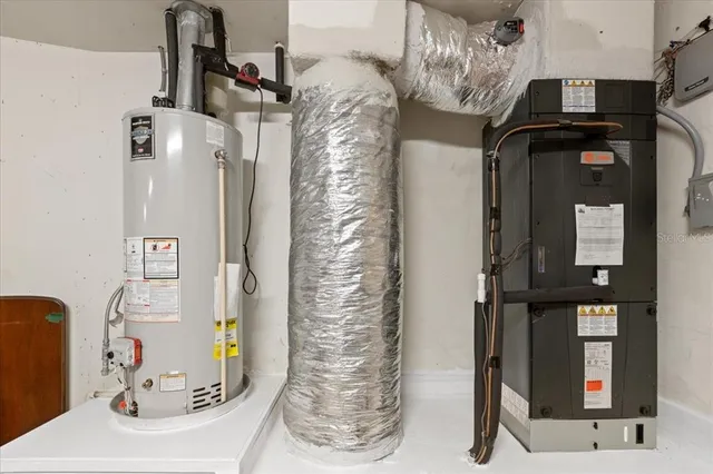 a view of a porch with furniture and a yard