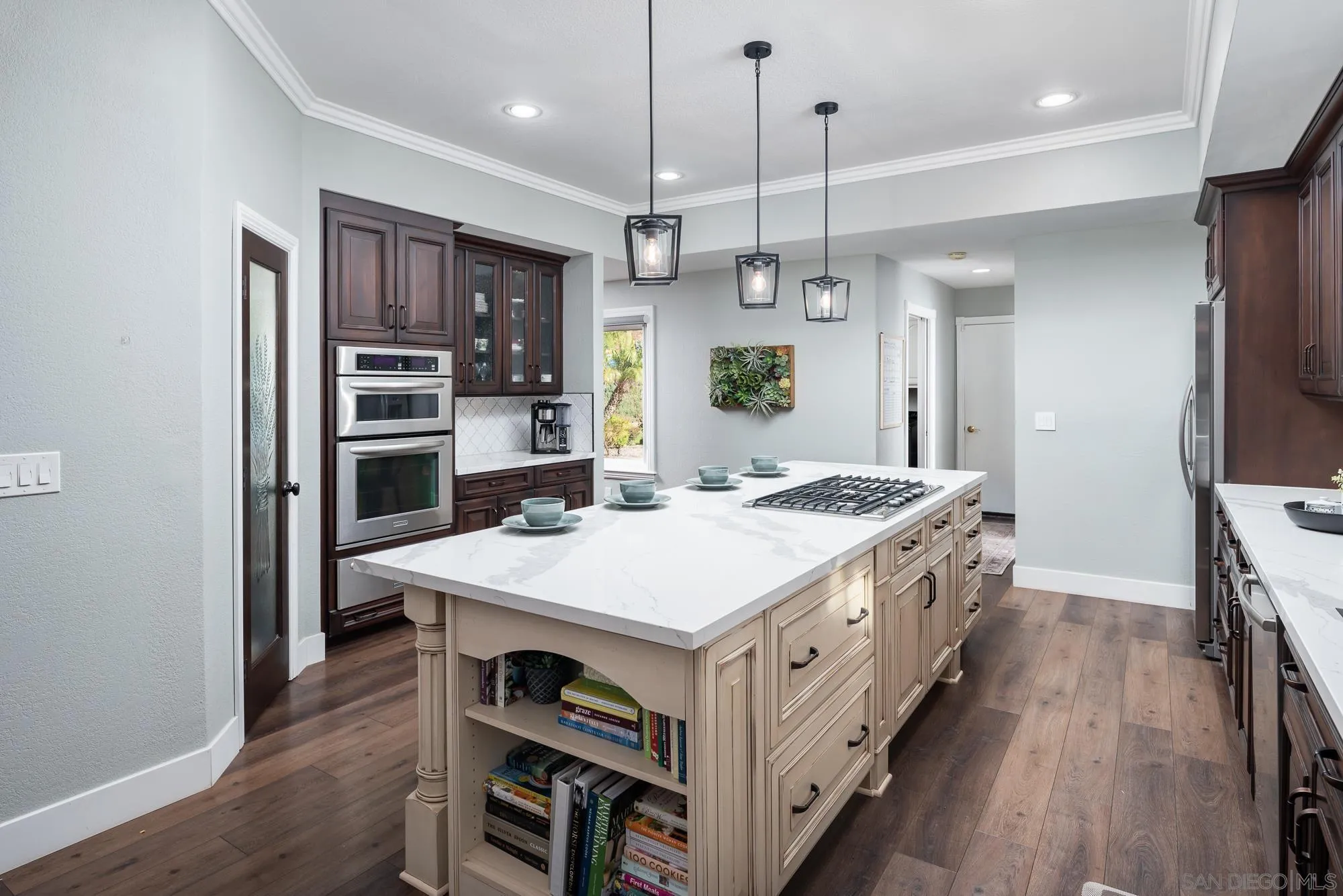 14298 Ipava Drive Poway, CA 92064 - Photo 15 of 74 a large kitchen with a table and chairs