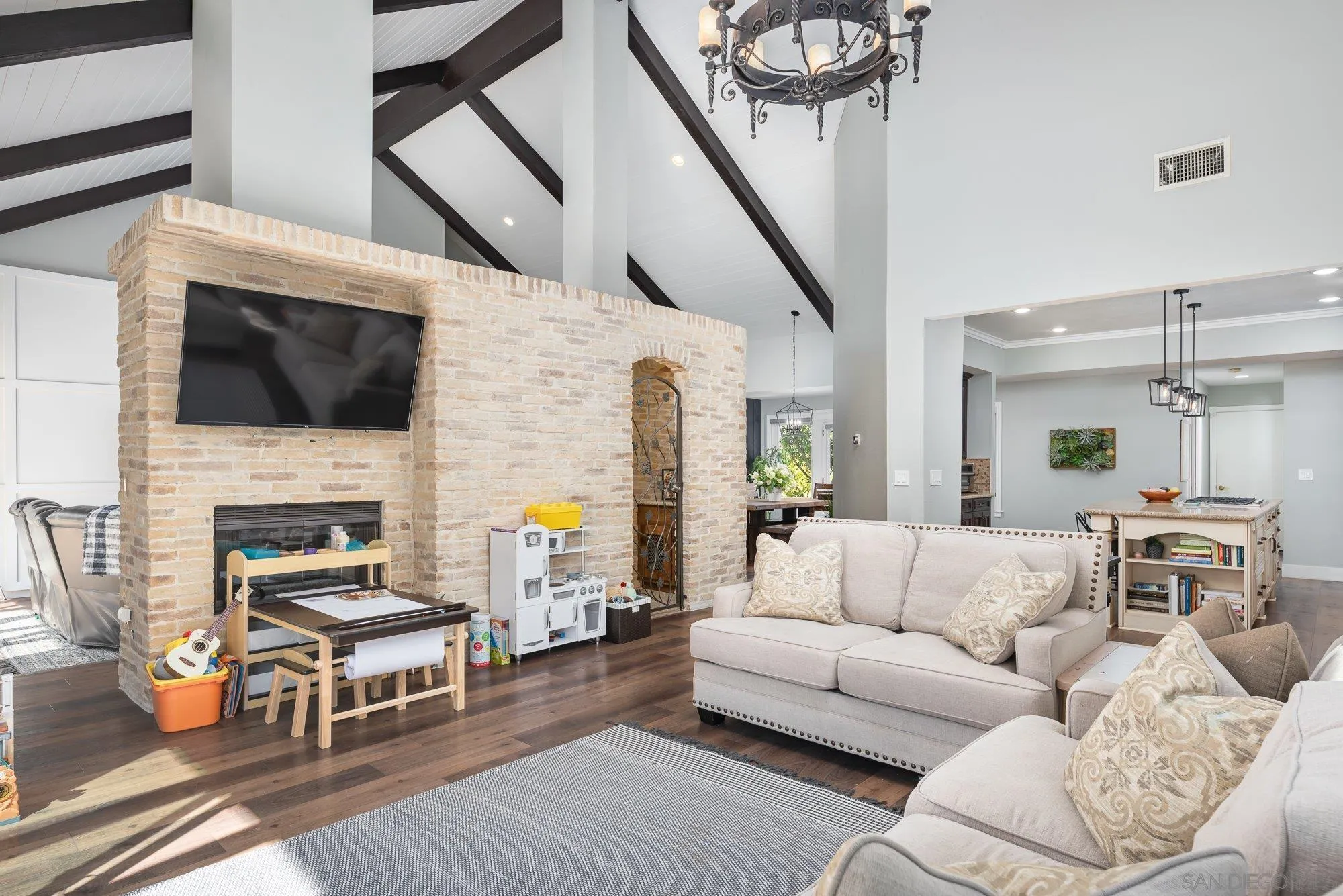14298 Ipava Drive Poway, CA 92064 - Photo 16 of 74 a living room with furniture or fireplace and a flat screen tv