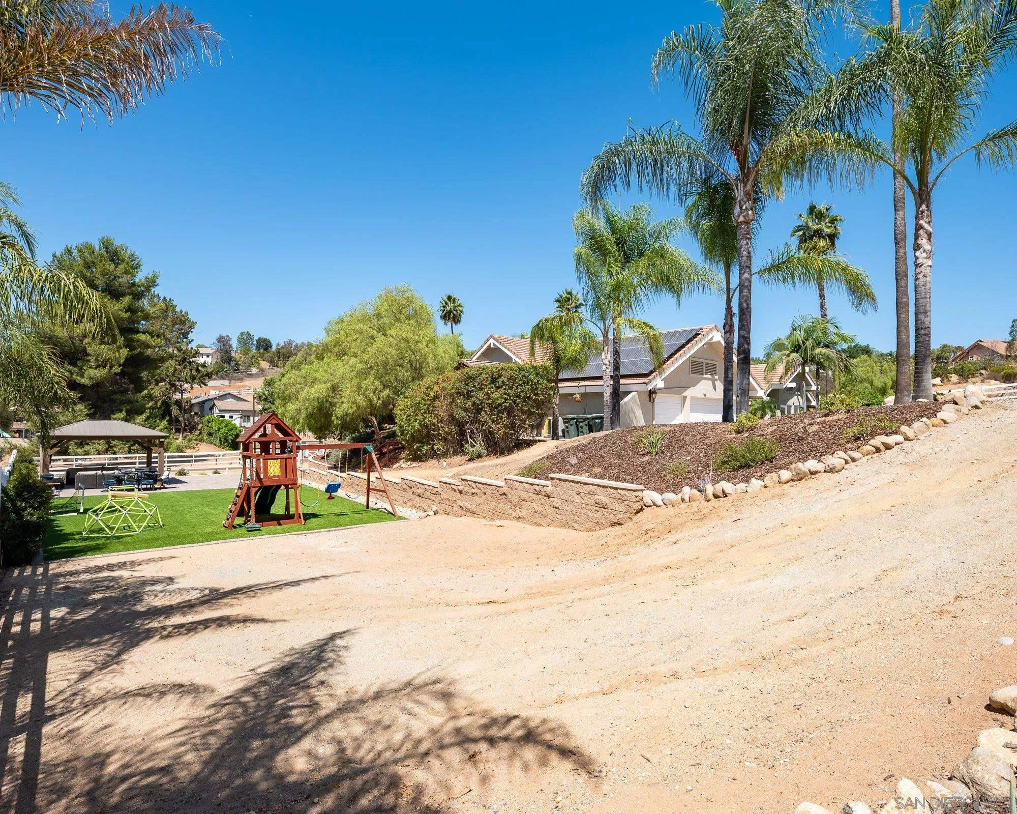 14298 Ipava Drive Poway, CA 92064 - Photo 60 of 74 a view of a backyard of a house