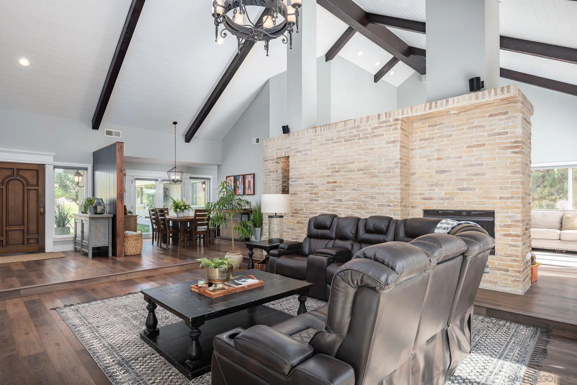 14298 Ipava Drive Poway, CA 92064 - Photo 9 of 74 a living room with fireplace furniture and a wooden floor