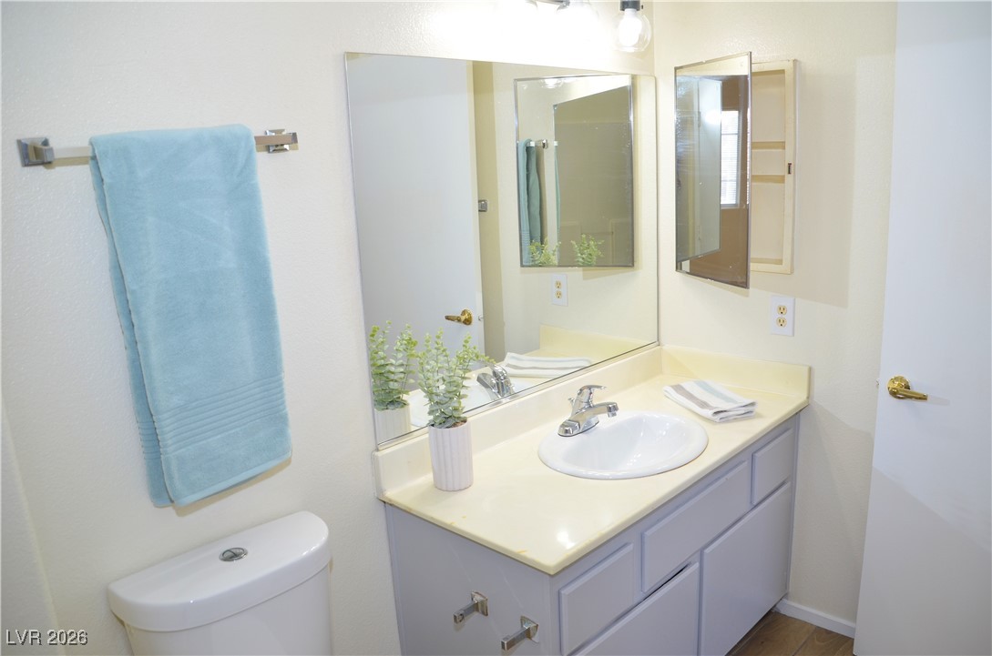 1881 West Alexander Road, Unit 2101 North Las Vegas, NV 89032 - Photo 18 of 37 Bathroom with toilet and vanity